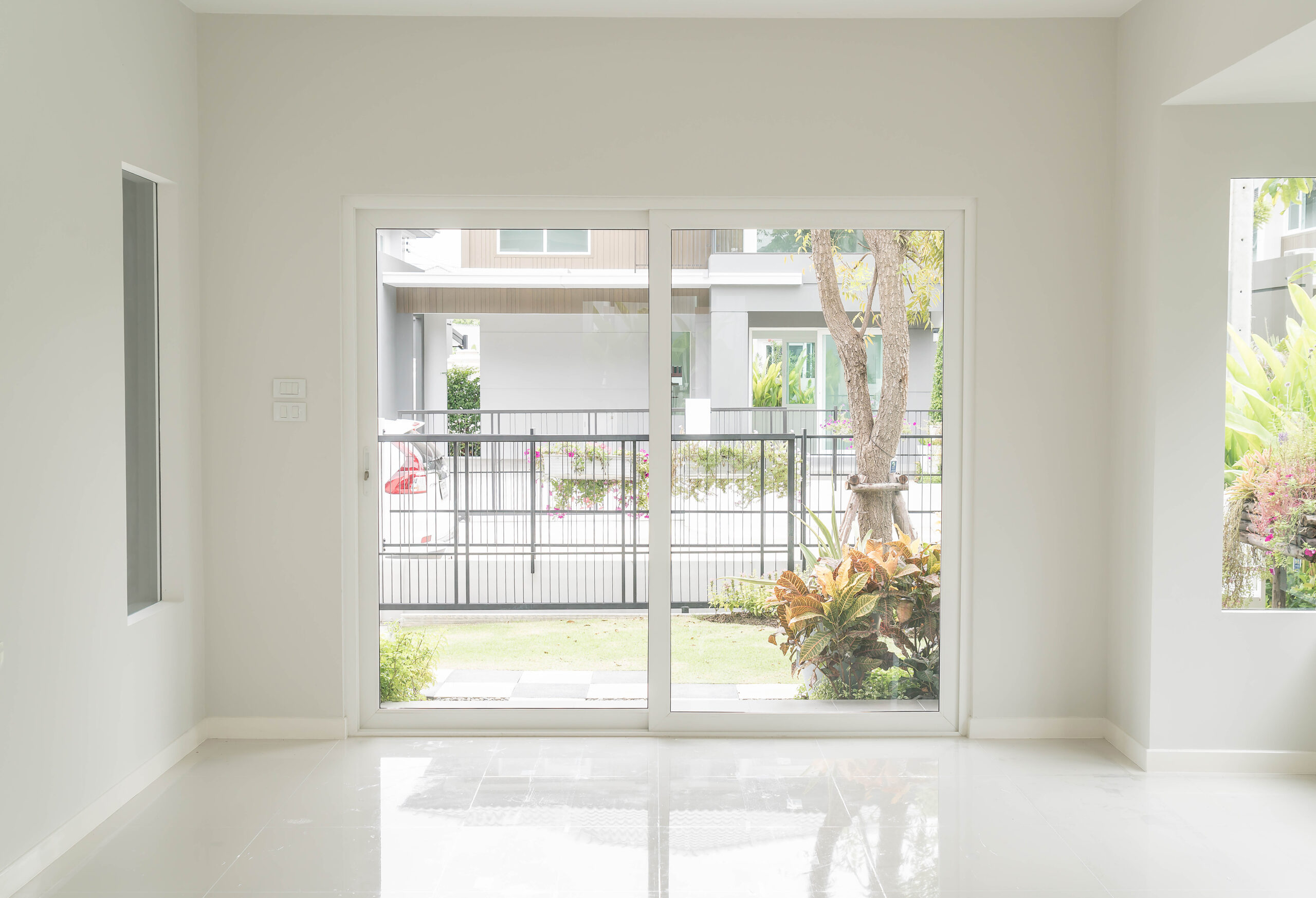 empty glass door in living room interior background